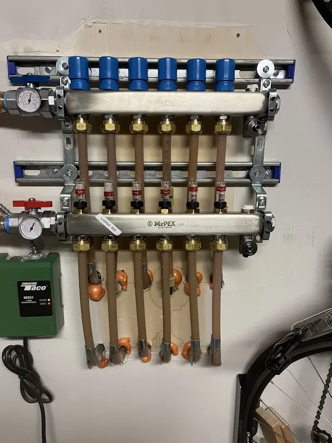 Plumber performing Water Heater Repair at a residential property in Camas